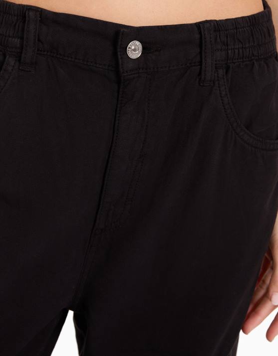 Schwarz Bershka Frauen Jogginghose aus Baumwolle mit geraffter Taille und Taschen H00J1346