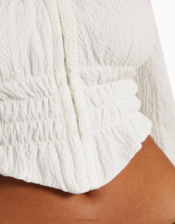 Creme Bershka Frauen Langärmlige, schulterfreie Bluse aus strukturiertem Webstoff H00J935