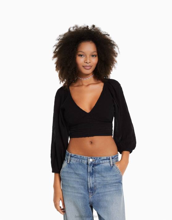 Schwarz Bershka Frauen voluminöse Langarmbluse mit V-Ausschnitt H00J952
