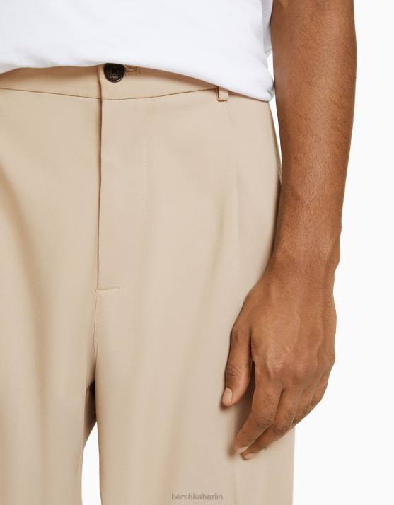 Sand Bershka Männer maßgeschneiderte, weite Hose im Jogger-Stil H00J3031