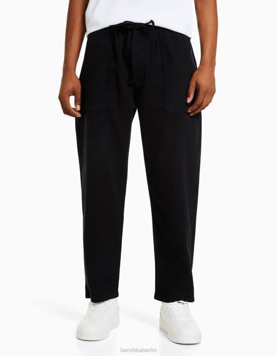 Schwarz Bershka Männer Rustikale, locker sitzende Hose H00J3214