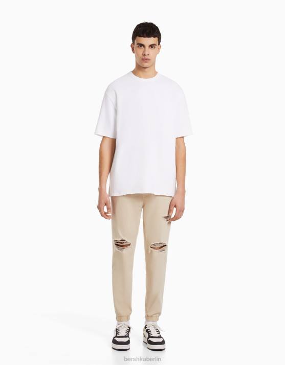 Beige Bershka Männer Zerrissene farbige Jogger-Jeans H00J3193