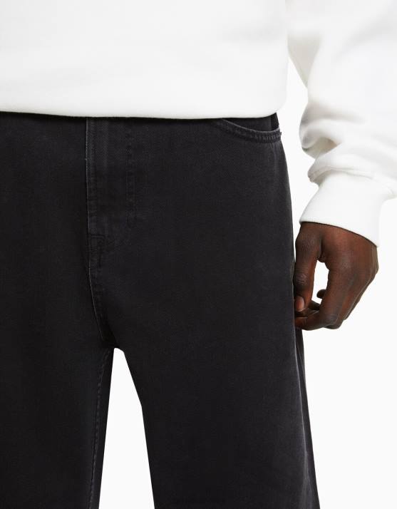 Schwarz Bershka Männer locker sitzende Jeans H00J3164