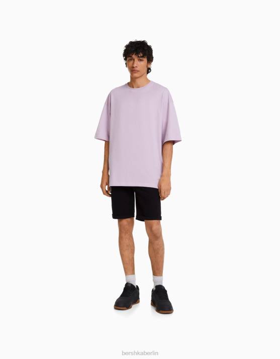 Schwarz Bershka Männer Enge, aufgerollte Denim-Bermudashorts H00J3347