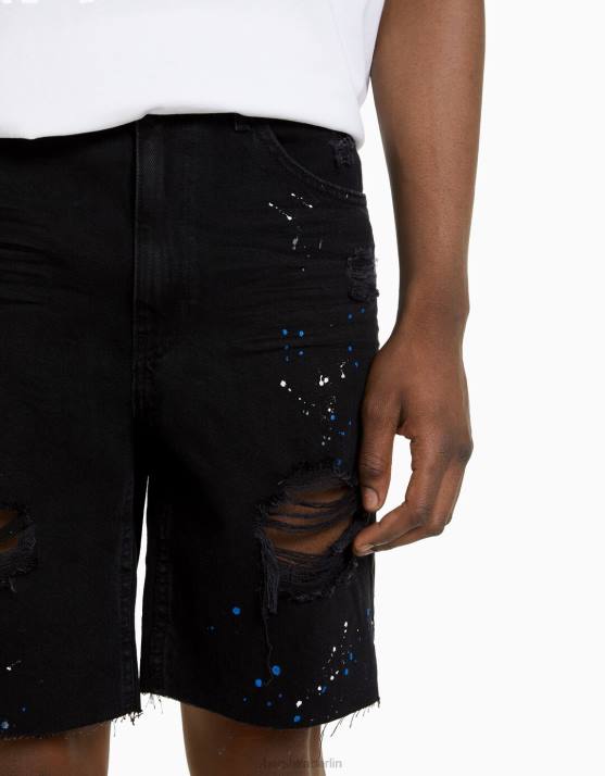 exklusiv Bershka Männer Zerrissene Denim-Bermudashorts mit Farbspritzern H00J3332