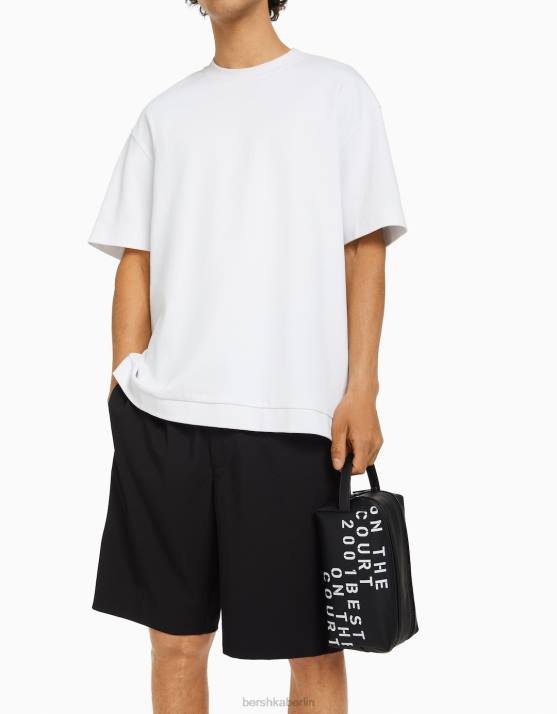 Schwarz Bershka Männer Kosmetiktasche mit Schriftzug H00J3584