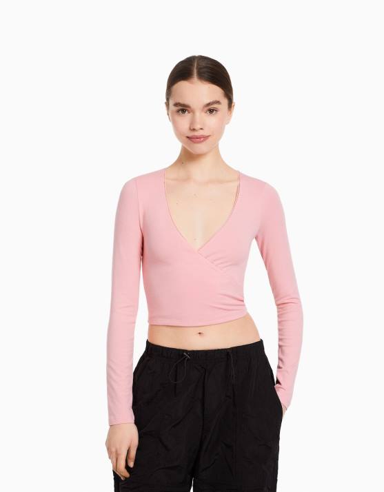 Rosa Bershka unisex Langarm-T-Shirt mit gekreuzten Ärmeln H00J3753